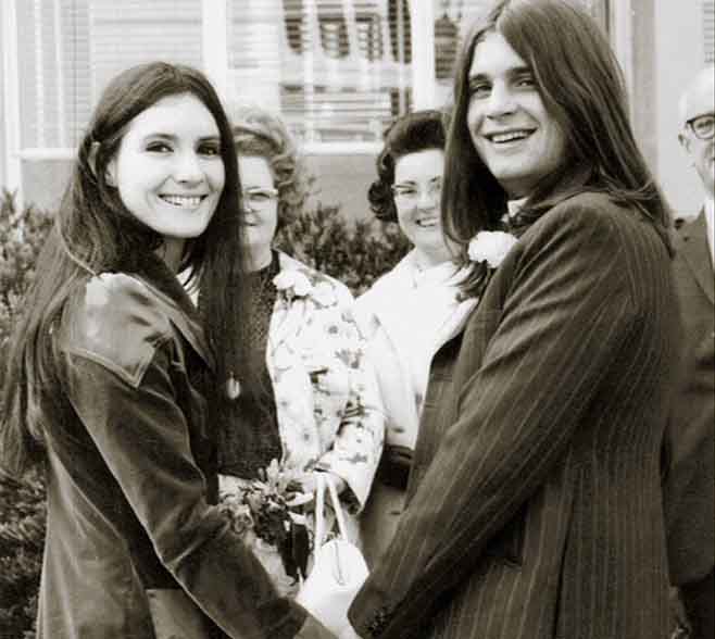 Thelma Riley and Ozzy Osbourne taking a picture together.